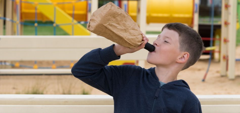 Child drinking alcohol