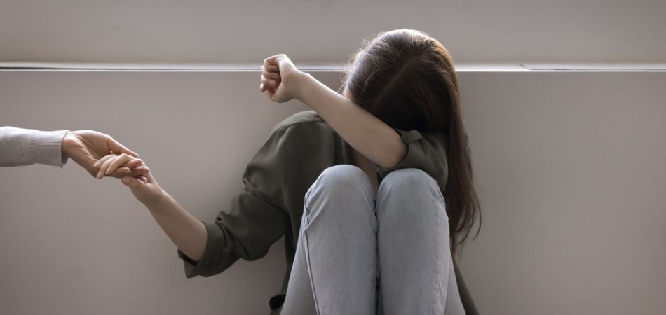 sad girl sitting in depression